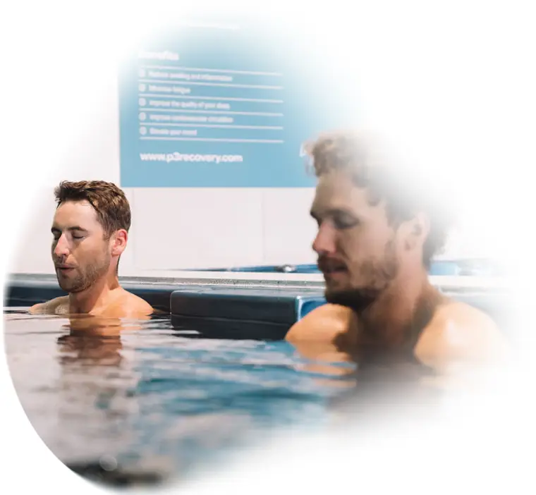 Two men in an ice bath at P3 Recovery